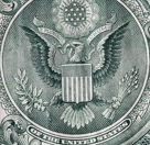 Shield of the United States on the $1 bill. Note the 13 arrow in his left foot,  olive branch with 13 leaves and 13 olives in his right foot, 13 stripes on the eagle's shield and 13 stars above the eagles head. .