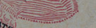 Repeating 'USA10' text on the edge of the printed statue of liberty flame on the $10 bill.