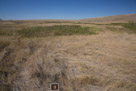 Looking north from within the valley where the tepees were located. The ridge in the right distance is where Army sharp shooters did the most damage to the indian warriors.