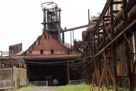 furnace house. The top of the blast furnace sticks through the top.