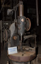 Wheel boring machine. As in train wheels. Drilled a centered hole in a otherwise finished and balanced wheel.