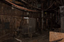 One of the back rooms with a number of machines in place. Note the overhead belts.