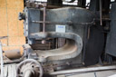 A shear. Note the rail wheel in the foreground for scale. Used to shear steal sheet up to about an inch thick.