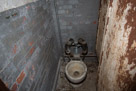 Another toilet with more modern flush.