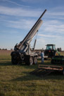 Now you start to get the picture. This is a serious piece of equipment.  This baby is mounted on a truck frame, has it's own hydraulics and compressor. The barrel is forty four feet of ten inch pipe. The air tank is made of several propane tanks welded together. With his steady diet of fresh pumpkins Mack Daddy weighs in at a svelte 20,000 pounds.