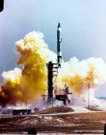 Gemini IV  liftoff June 3, 1965.   
The Titan II rocket which carried the Gemini spacecraft was guided by its own (separate) ASC-15 guidance computer. The Gemini Guidance Computer, sometimes called the Gemini Spacecraft On-Board Computer (OBC), was very similar to the Saturn Launch Vehicle Digital Computer. The Gemini Guidance Computer weighed 58.98 pounds (26.75 kg). The core memory had 4096 addresses, each containing a 39-bit word, composed of three 13-bit 