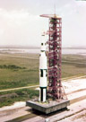 An Apollo V on the way to pad 39A.  I worked in the platform under the rocket base. That is a two story building equivalent. We had a RCA 110A cumputer in there that we operated and maintained. It was the Mobile Launcher Computer(MLC) and directly connected to the various rocket states(through relays of course). It controled fueling, pressurization and started the launch sequencer that actually ignited the engines.