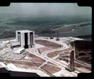 A nice view of the Vertical Assembly Building (VAB) .  Boiler plate Saturn  V 500F is being rolled out at the lower right.