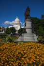 This was an exceptional day for photogrphy.  Black-eyed Susans in the foreground with the Garfeld status with the Capitol in the background.