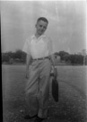 Age 12 years 3 months 12 days
August 31, 1954
Second day of school. We were at the Walston Place then. The barn can be seen in the background. Mr Walston had had a small dairy and had a nice barn with milking stalls and a second story for hay. The barn had electricity, note power pole at right. And there is a pig pen just to the right of the barn. This picture is taken in front of the house. I can not explain the sheer shirt. I suppose it was cool.