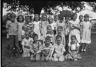 Age 7 years, 1 day.
May 20, 1949.
Birthday party.
Back row - unknown girl, Brawley boy, Mary Jane Doll, Mike Wheeler, Dephane Wilkerson, Nancy Wagoner, Patsy Tipton?, Decker boy, Johnny Hodge, Sie Ellis, Po Ellis(below), Gayla Miller, Jimmy Decker, Unknown girl.
Front row - unknown kid, Kenneth Hudson, unknown kid(between heads), Sam Short, Harvey Low(kneeling), Donald Kothman(kneeling), Max Surber, Patrick Higgins, Sandra Sue Smith