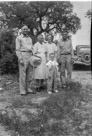 Age 3 years, 11 months, 27 days.
May 16, 1946.
Dad(Clint Higgins), Grandma Higgins, dad's half sister Pearl, dad's brother Clyde and me. 
Picture is taken at Grandma Higgins's place near Star Texas.
Note the car. It was not ours.