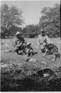 Age 3 years, 11 months, 26 days.
May 15, 1946.
At the old home place near Star Texas where dad was born. 
Don't know the name of the dog.  Dad is the man on the left, uncle Clyde is the man at the right with the hound.