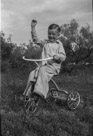 Aged 5 years
May 19, 1947.
Tricycle was for my birthday.  Riding a tricycle around the West Texas countryside was not as easy as one might imagine.