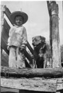 Aged 5 years 2 months 24 days
August 12, 1947
Dog is Suppie.
In loading chute in the pens at the Johnson Place.