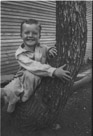 Aged 5 years, 1 month.
June 19, 1947. 
Tree-hugger to be?? I don't think so.