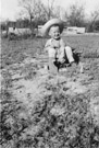 Aged 2 years, 11 months, 6 days.
April 25, 1945.
Playing with excellent truck. This may have been at the Tip;ton place east of town. I have no memory of this time and am not sure of its location.