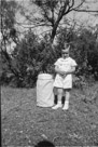 3 years, 3 days ol,d.
May 22, 1945.
Sun  was very bright in the child's eyes. I have no idea how mom kept me that clean..