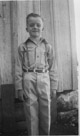 Aged 6 years, 11 months, 7 days.
April 26, 1949
Johnson Place. Belt and suspenders.  Check the creases in the pants.