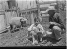 Aged 10 years, 11 months.
April 19, 1953. 
Tillie and her new lamb with me and dad. Tillie is the ewe in the very back. Picture is taken at the Walston Place.