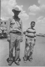 Aged 12 years, 1 month, 19 days.
July 8, 1954.
In the parking lot of Carlsbad Caverns National Park.