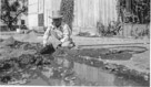 Aged 11 years, 4 months.
September 19, 1953.
Irrigating my garden at the Walston Place. At the time we lived there it was owned by A.B. 