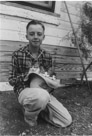 Aged 13 years, 1 month.
June 19, 1955.
With three unnamed kittens.