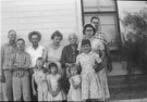 Aged 13 years, 11 months, 18 days.
May 6, 1956.
Family from San Angelo.
Front row kids - James Odell Cox, Mary Cox, Louise Kirby, Wanda Kirby.
Back Row - Clint Higgins(dad), Patrick Higgins, Jimmy Cox, Mozel(Kirby) Cox, Nanoni Kirby(Maternal GrandMother), Martha Kirby, Odell Kirby.