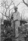 March 10, 1957.
Dad burning pear at the Spence Place. People may have forgotten this. Back in the drough of the 50s there was no grazing on the range for the livestock and most could not afford to feed their cattle for a growing season. The cattle got so hungry that they would eat prickly pear thorns an all. People started burning the thorns of the pear with these pear burners. The tank under dad's arm contains pressurized kerosene. To use it you preheated the head over a fire. When it was hot enough the fire from the burner made it self sustaining. Many people burned pear to make it through those years. I think this period broke dad's spirit. He never was the same after the struggle to keep the livestock healthy during this period. And don't forget, we still had screw worms to deal with. Cows with mouth sores from eating unburned pear would be attacked by the screworms and killed or disfigured if not treated promptly. Tough times.