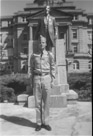 Aged 18 years, 4 months, 26 days. 
October 15, 1960.
Fish Higgins at attention in front of the statue or Lawerence Sullivan Ross, Soldier, Statesman, Knighly Gentleman and first president of The Agricultural and Mechanical College or Texas.  The Academic building is in the background.  he shoulder braid indicates that I am in the band.