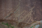 Moving on along the rock face.  A little Kokopelli here. And a cloven hoved sheep.  This panel is close to the ground.