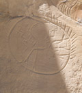 A fringed shield in the shadows.  Are the geometric lines representing lightening?
