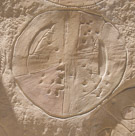 Now a more typical shield from this site.   Appears to be 2 lions with a geometric pattern or cross. It appears to have been painted at one time.