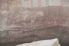 Note the squiggly line to the right of the 'O' after Andrew. This appears to be an original. There appears to be a petroglyph horned creature to the right.