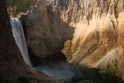 Now there you go. The rainbow is always there if the sun is out.  Note the green moss on the other side of Yellowstone canyon feed by the mist.