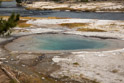 A hot pool by the trail to the Grand Prismatic Spring.  Pools like this do not freeze over even in the coldest of winters.  Whiffs of steam blow of them even is summer.